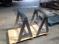 Stainless steel legs for a glass table