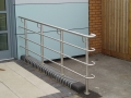Brushed stainless handrail on side entrance with wheelchair access