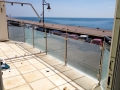 Glass and stainless steel balustrade on Seaton Seafront.