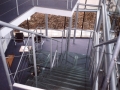 Internal lobby staircase with glass treads...
