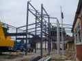 Erecting structural steel frame...